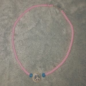 pink peace sign necklace